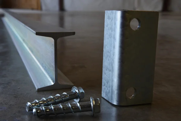 metal beam, metal hinge and screws